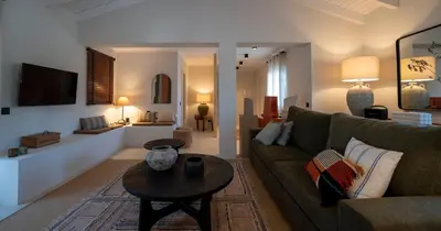 a living room with a couch and a table at Az Ribat Sea e Sun in Aljezur